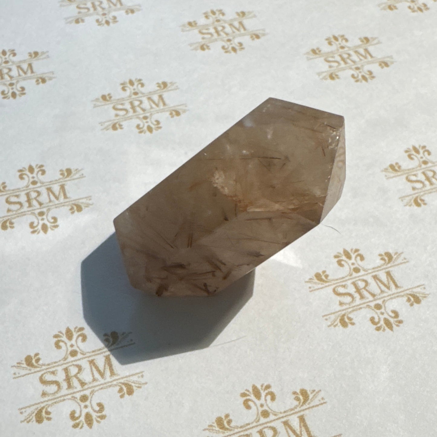 Point : Rutile in Quartz, ~1½"