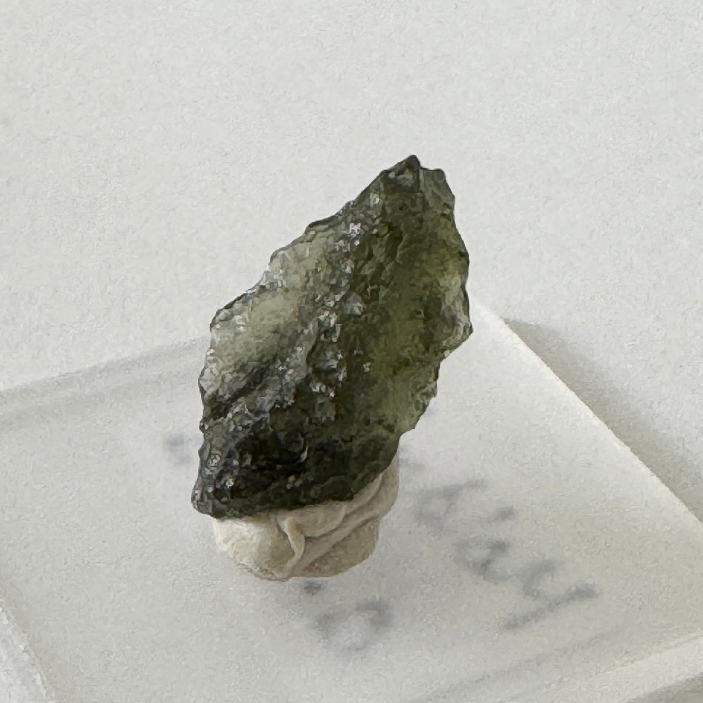 Rough : Mounted : Moldavite, less than 1 gram