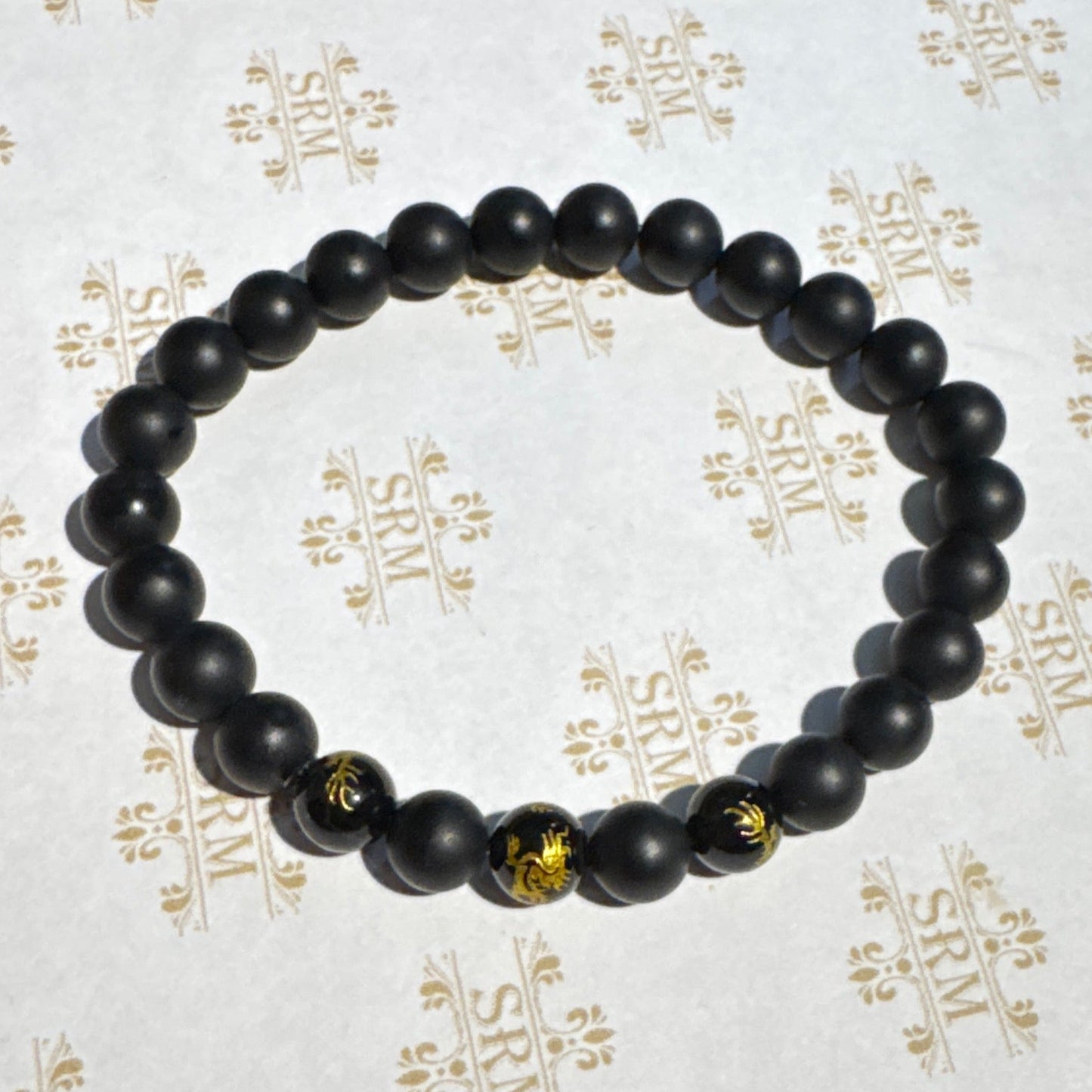 Bracelet : 8mm Matte Black Tourmaline and Black Onyx/Gold Dragon, 6¾", 7”