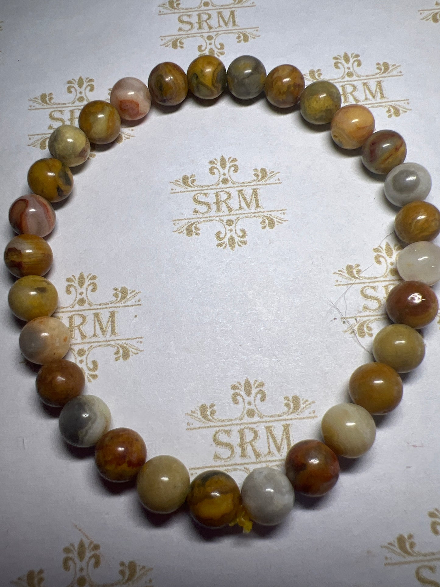 Bracelet : 6mm Crazy Lace Agate, 6½”.