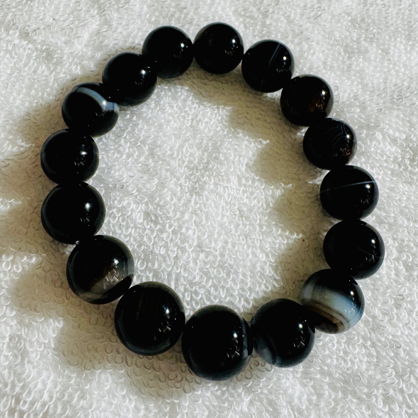 Bracelet : 11-12mm Botswana Agate, Black Banded, 6"