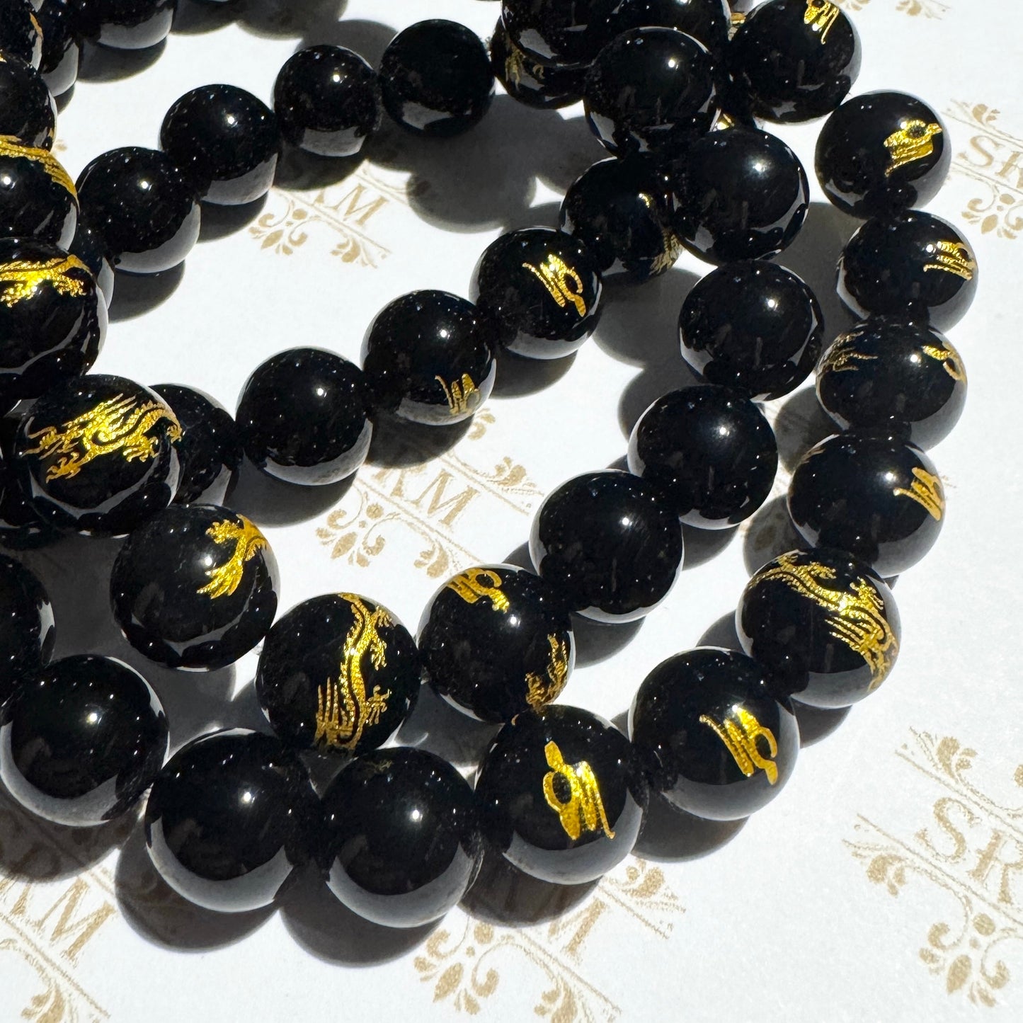 Bracelet : 10mm Polished Tourmaline and Black Onyx/Gold Dragon, 6¾", 7"