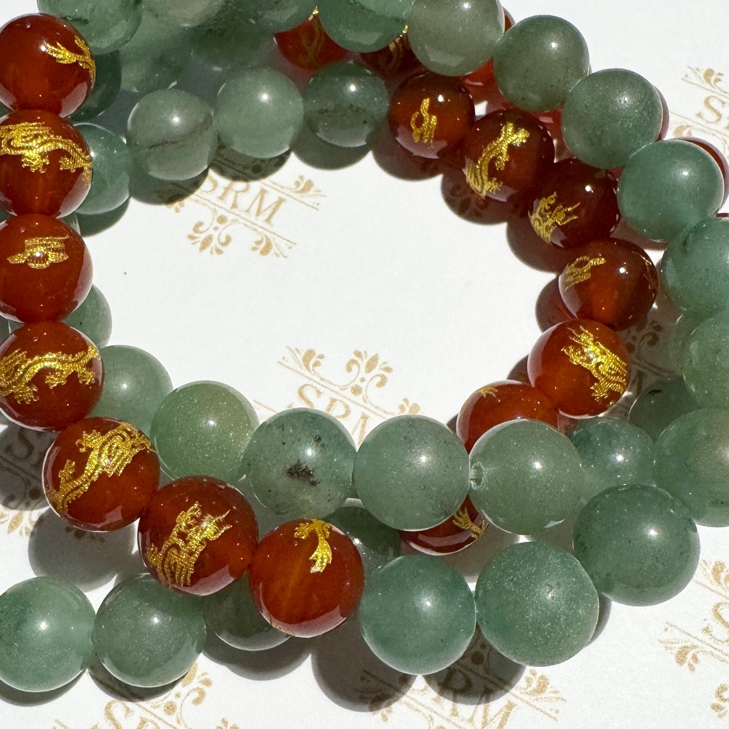 Bracelet : 10mm Green Jadeite and Carnelian Dragons, 6¾", 7"