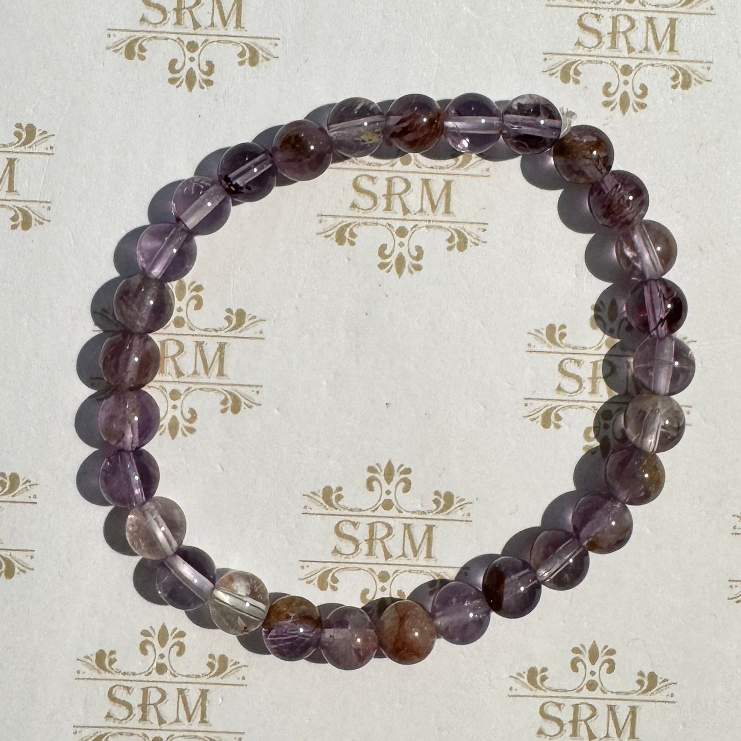 Bracelet : 6mm Super 7 Amethyst