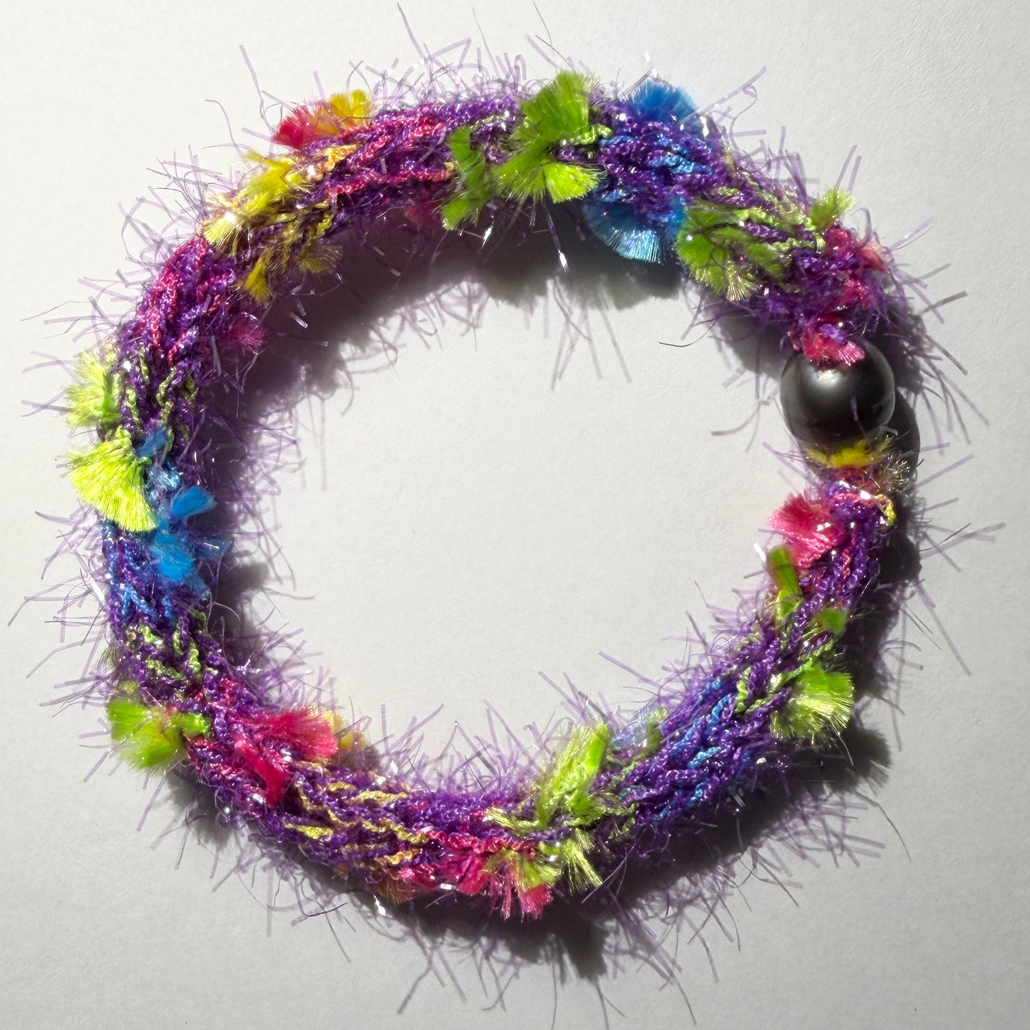 Bracelet : 8” Feathery Purple Shimmer Strands with 11mm Tahitian Pearl