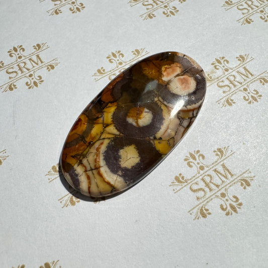 Cab : Bird's Eye Rhyolite, 45mm x 24mm x 4mm, 51ct, Oval