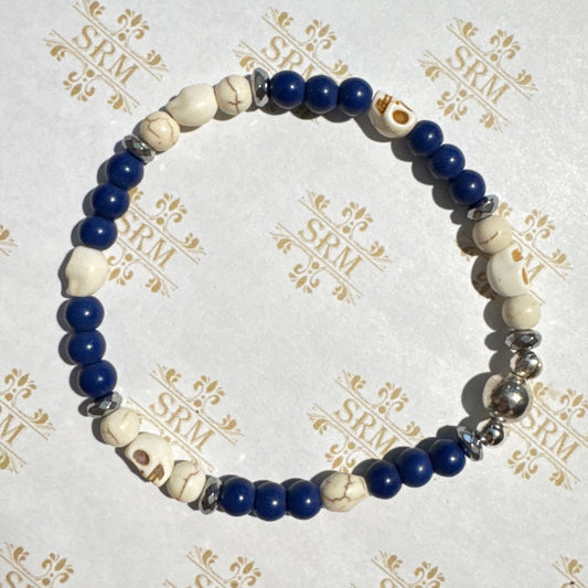 Bracelet : 6mm Skulls and Blue Bead Triples, 7½"