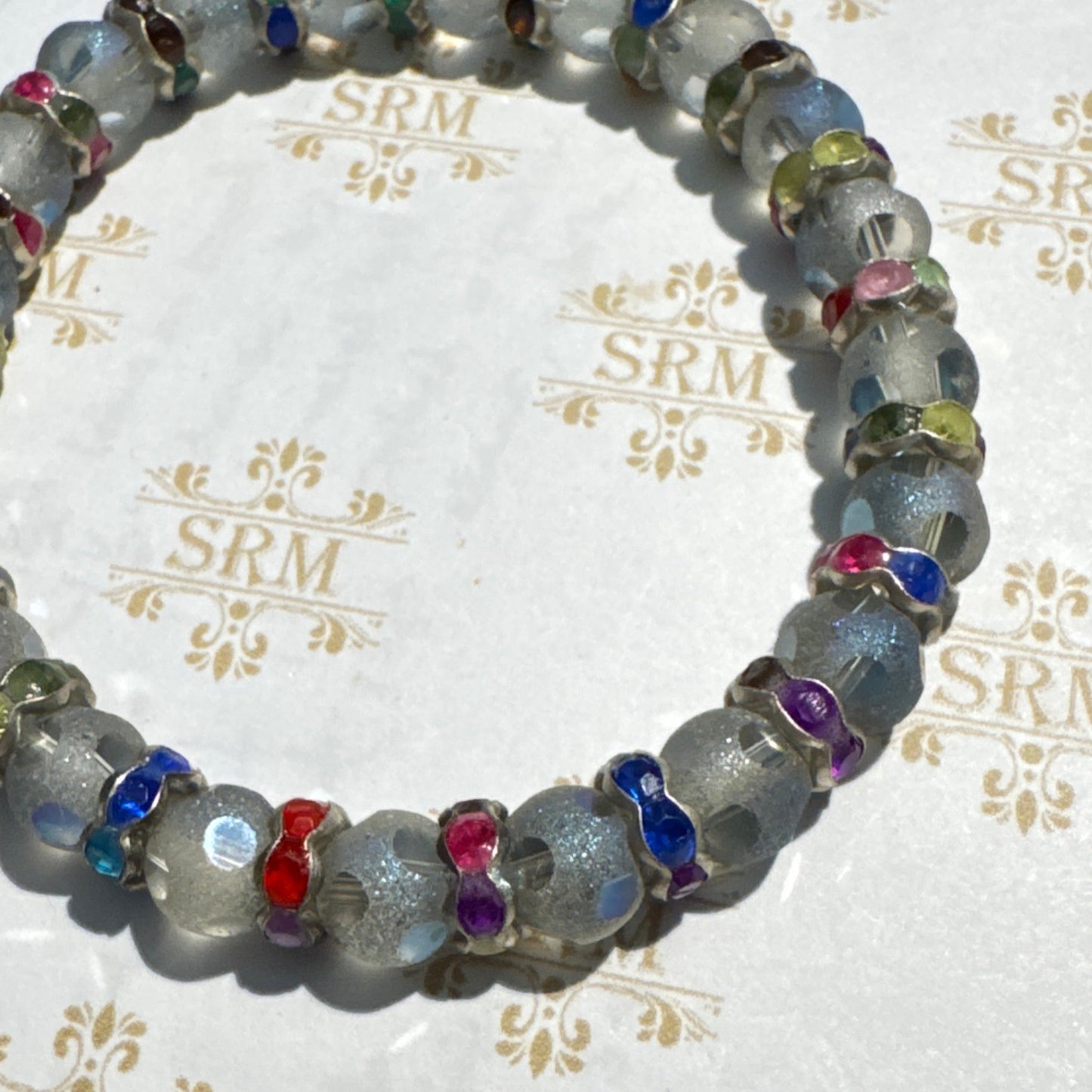 Bracelet : 8mm Frosted Glass Beads Pale Blue and Multi-color Rhinestones, 7"
