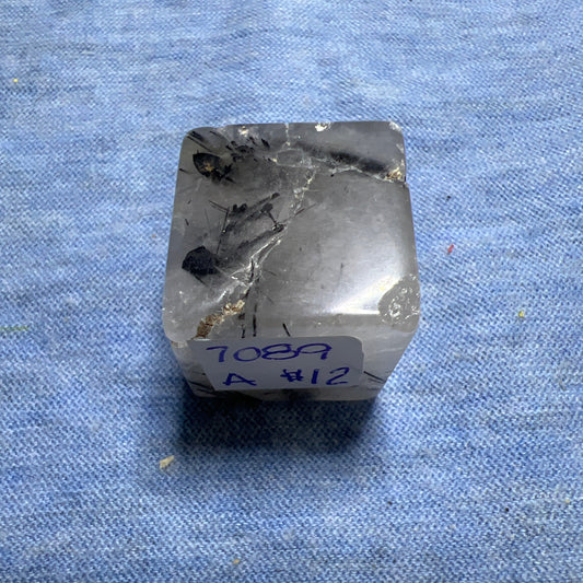 Novelty : Tourmaline in quartz cube.  Approx.  3/4”.  Choice!