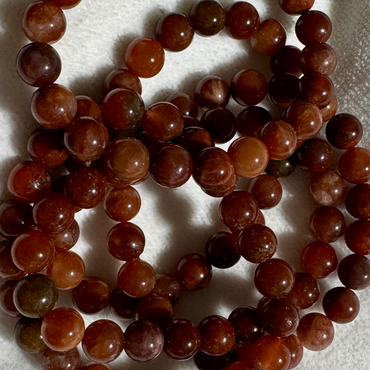 Bracelet : 5-6mm Fire Cherry Rutile Quartz, 7"
