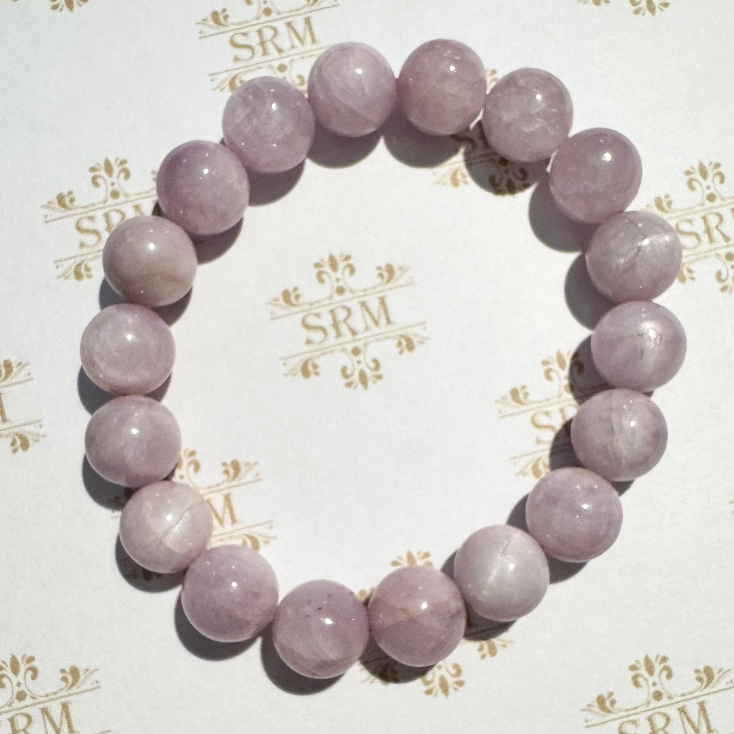 Bracelet : 10mm Lavender Pink Kunzite, ~6¾"