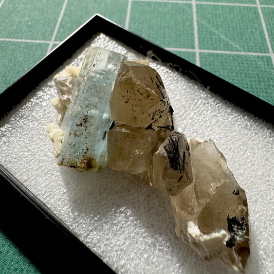 Crystal : Mounted : Natural Aquamarine on Smoky Quartz with Tourmaline inclusions and Feldspar, Namibia, 29g