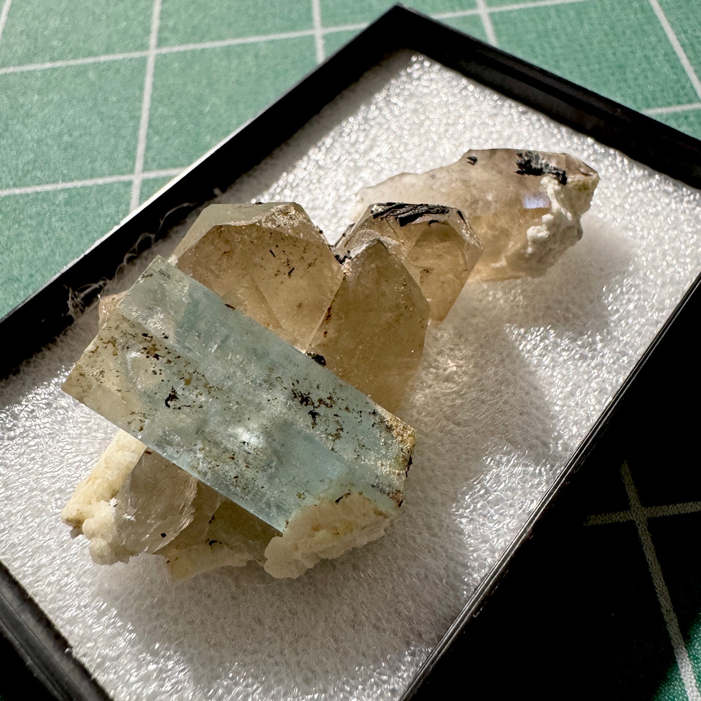 Crystal : Mounted : Natural Aquamarine on Smoky Quartz with Tourmaline inclusions and Feldspar, Namibia, 29g